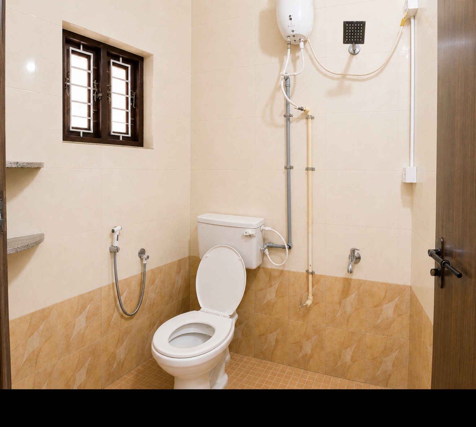 Private bathroom in Lotus Apartment at Balakrishna Udupi Homestay